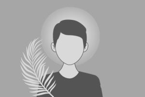 Symboliczna grafika w kolorze biało-czarnym przedstawiająca męczennika z gałązką palmową.