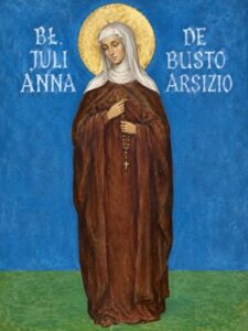 bł. Julianna de Busto Arsizio w postawie stojącej w brązowym habicie i różańcem w dłoniach