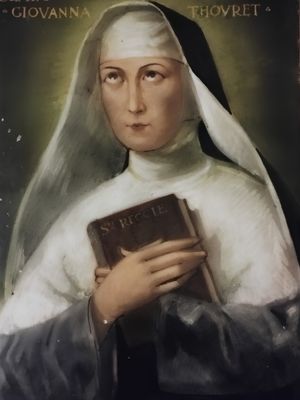 Obraz św. Joanny Antydy Thouret książką w dłoniach.