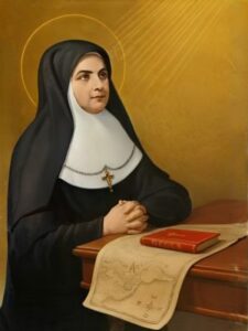Święta Maria Soledad Torres Acosta portret siedzącej zakonnicy przy stoliku, na którym leży mapa i czerwona książka.