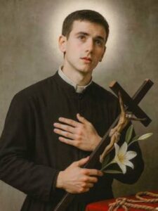 Święty Gerard Majella na obrazie z krzyżem i liliami w dłoni.